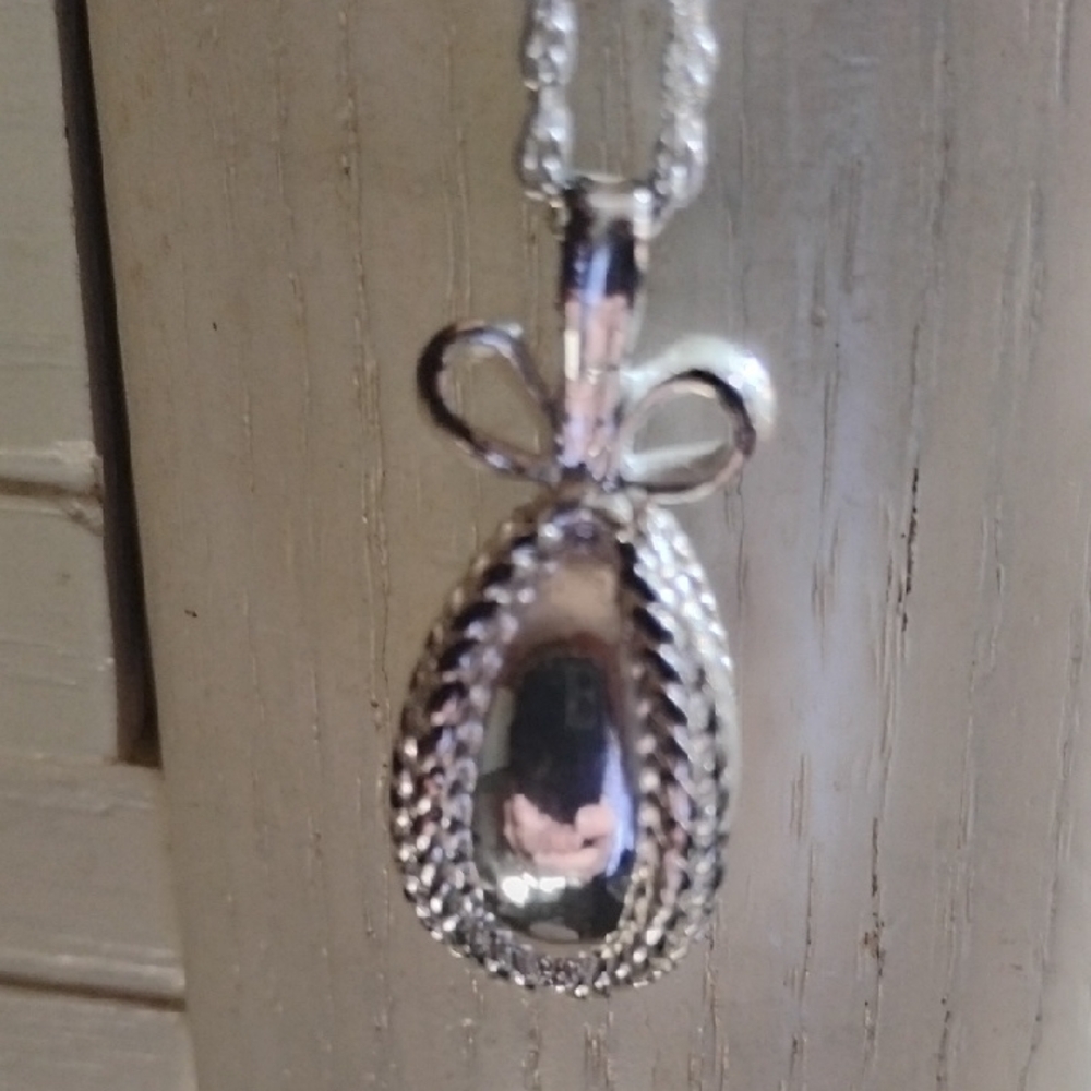 Joan Rivers Silver Egg Necklace